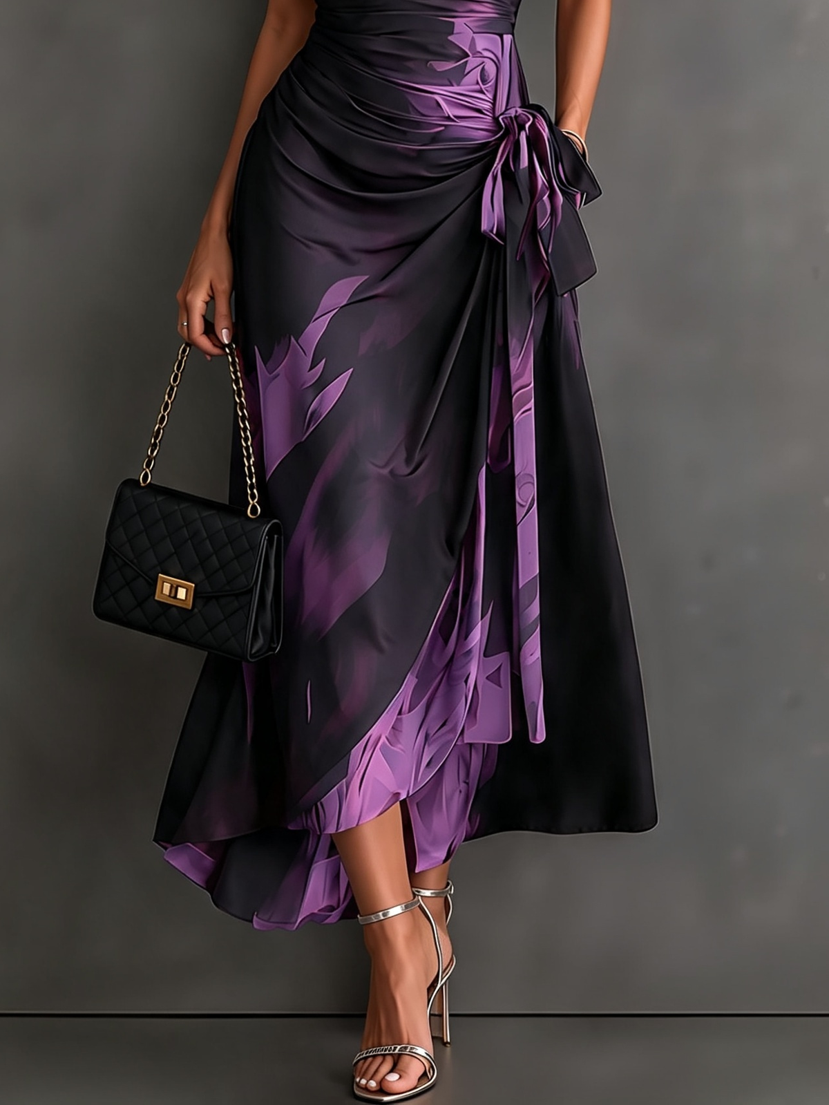 Grey abstract print maxi dress, demonstrating its comfortable, flattering fit and beautiful, flowing drape.