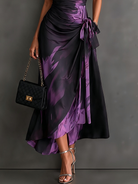 Grey abstract print maxi dress, demonstrating its comfortable, flattering fit and beautiful, flowing drape.