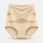 Overhead shot of the black shaping underwear on a dark background, presented with elegant simplicity.
