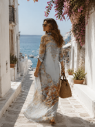 Side profile of the relaxed short sleeve maxi dress, highlighting its comfortable fit and full-length design.