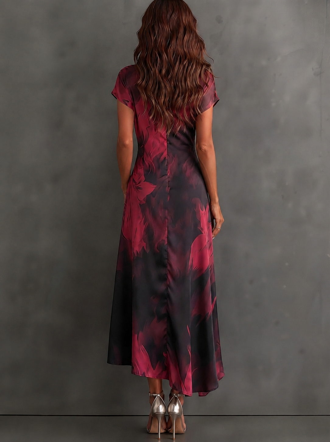 Back view of the purple abstract print maxi dress, highlighting its graceful drape and long silhouette.