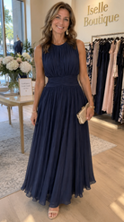 Close-up of the gathered bodice and wide ruched waistband detail on the comfortable maxi dress, highlighting fabric texture.