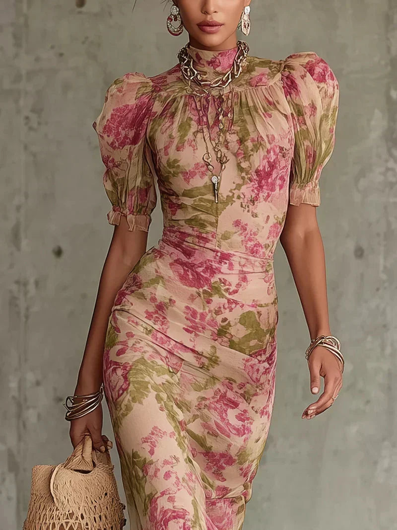 Close-up detail of the delicate ruffled puff sleeves and high neckline of the elegant floral maxi dress.