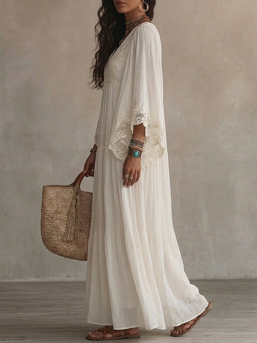 Rear view of the graceful ivory Ianthe maxi dress, highlighting its airy fall and comfortable silhouette.