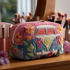 Alana retro floral quilted cosmetic bag in a medium size, showcasing its intricate pattern and soft texture on a light background.