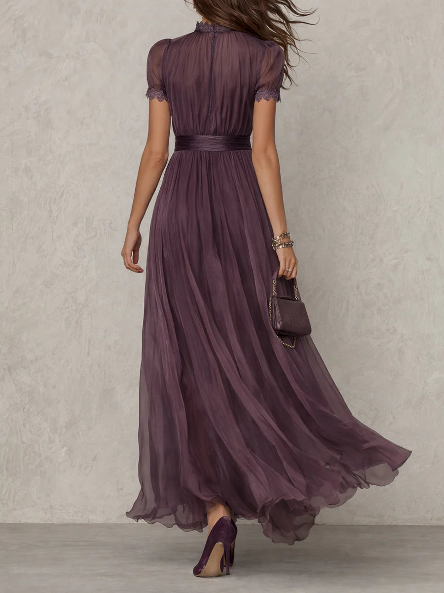 Close-up detail of the keyhole neckline and subtle lace accents on the bodice of the chiffon maxi dress.