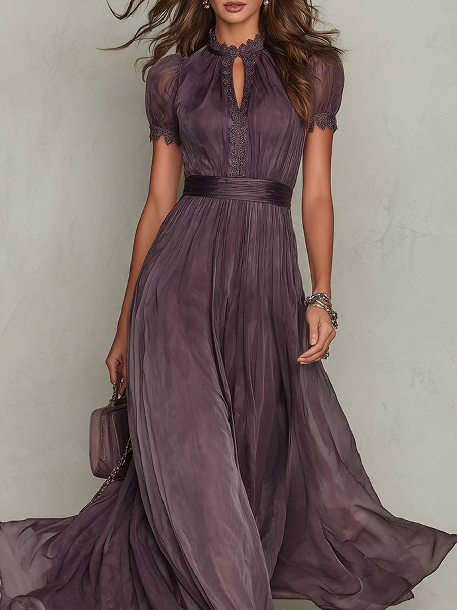 Back view of the purple flowing chiffon lace maxi dress, showing the drape of the fabric and the full length.