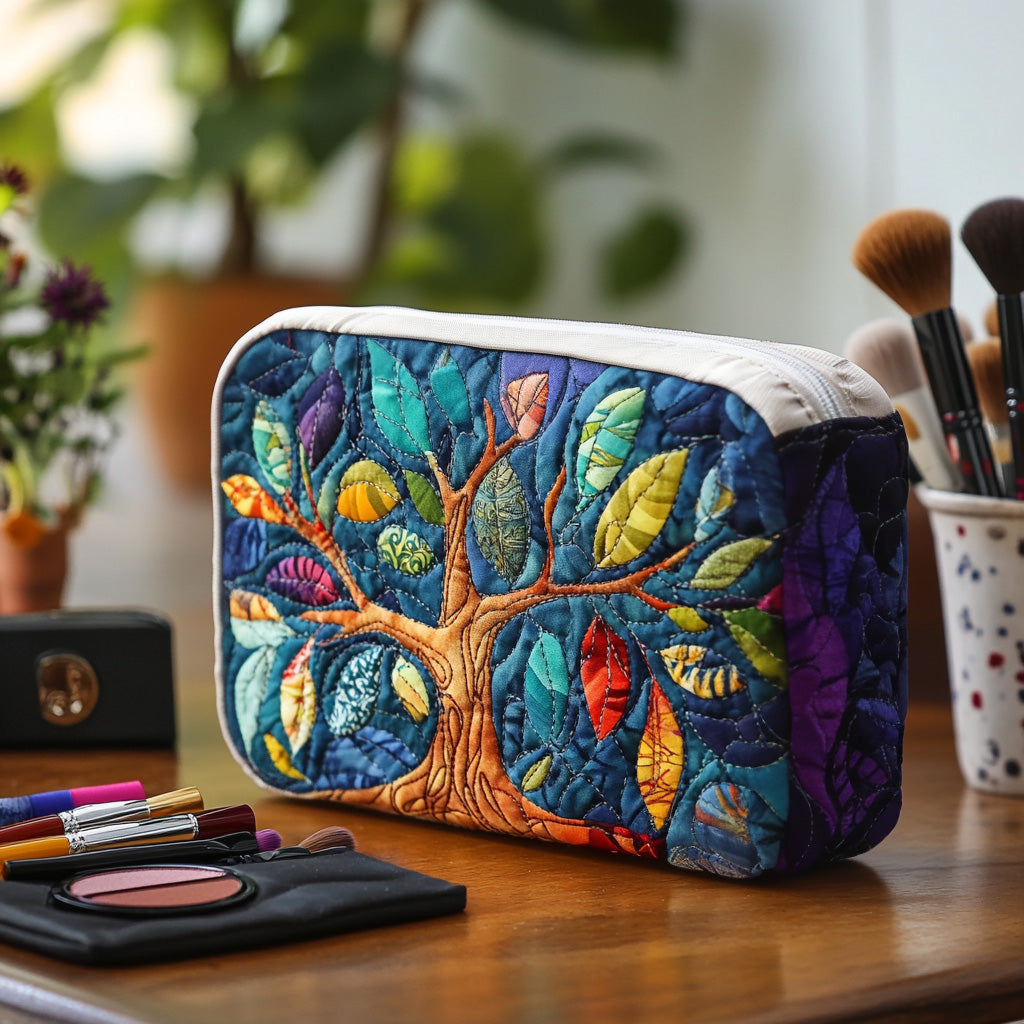 Front view of a Anouk quilted cosmetic organizer bag in a unique albero simbolico print, showcasing its elegant design.