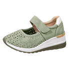 Side view of a pair of Celeste comfort arch support sandals in a light color, showcasing the elevated sole.