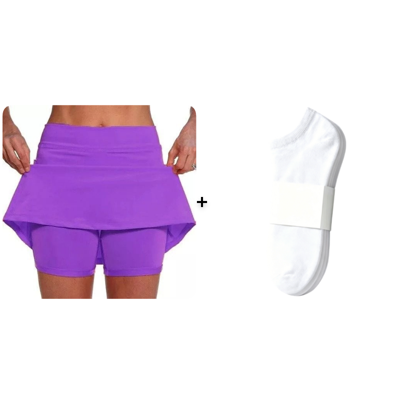 The smooth, wrinkle-resistant texture of the light gray active skort fabric.