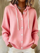 Front view of a pink Daphne T-shirt with a soft knit texture, styled casually.