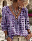 Mist blue blouse, shown in a relaxed setting, perfect for everyday wear during spring and summer.