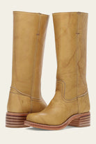 Full front view of Elara women's classic Western boots in light brown, showcasing the mid-calf design and subtle stitching.