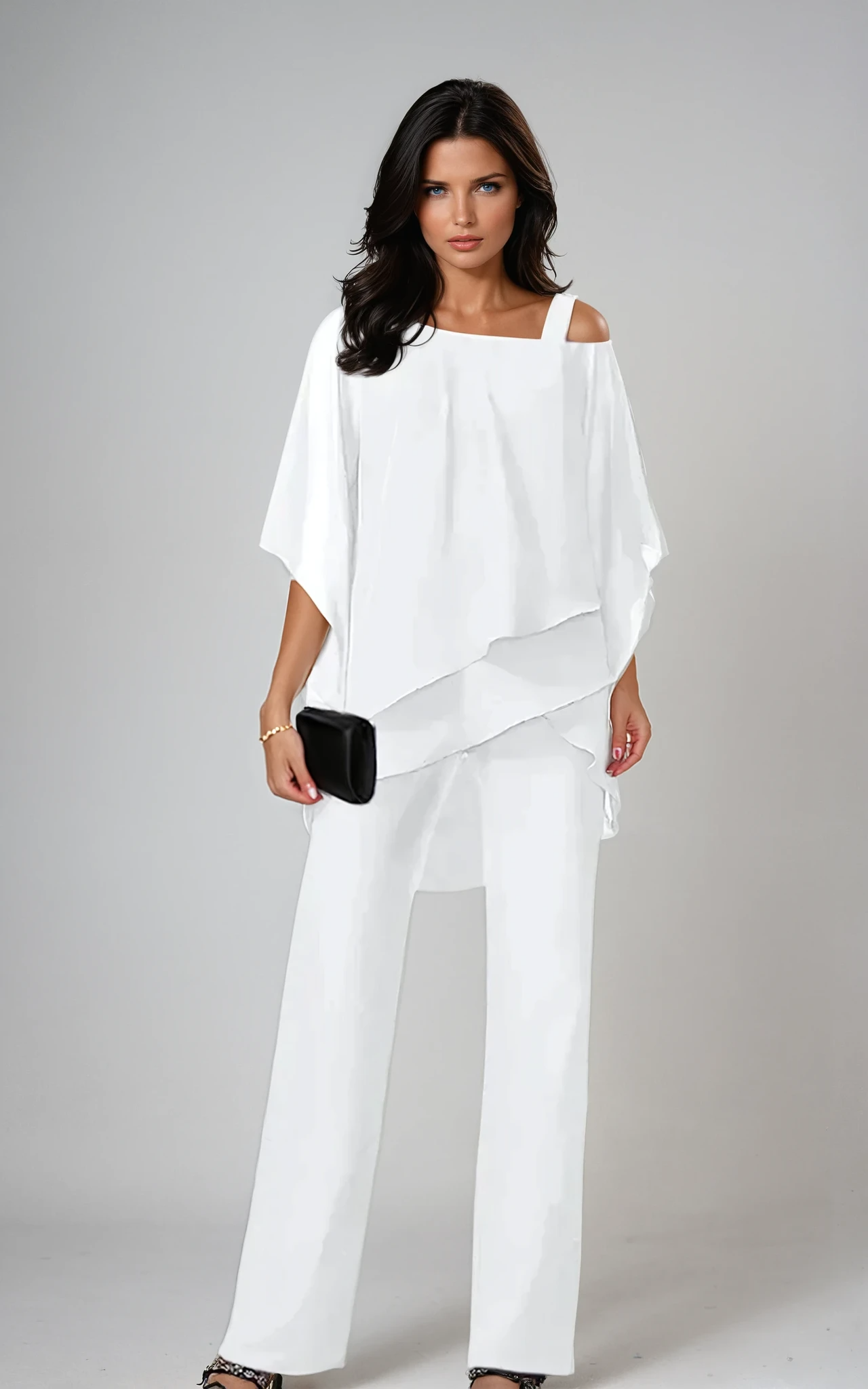 Front view of the Elara two-piece layered set in black, showcasing its flowing silhouette and elegant design.