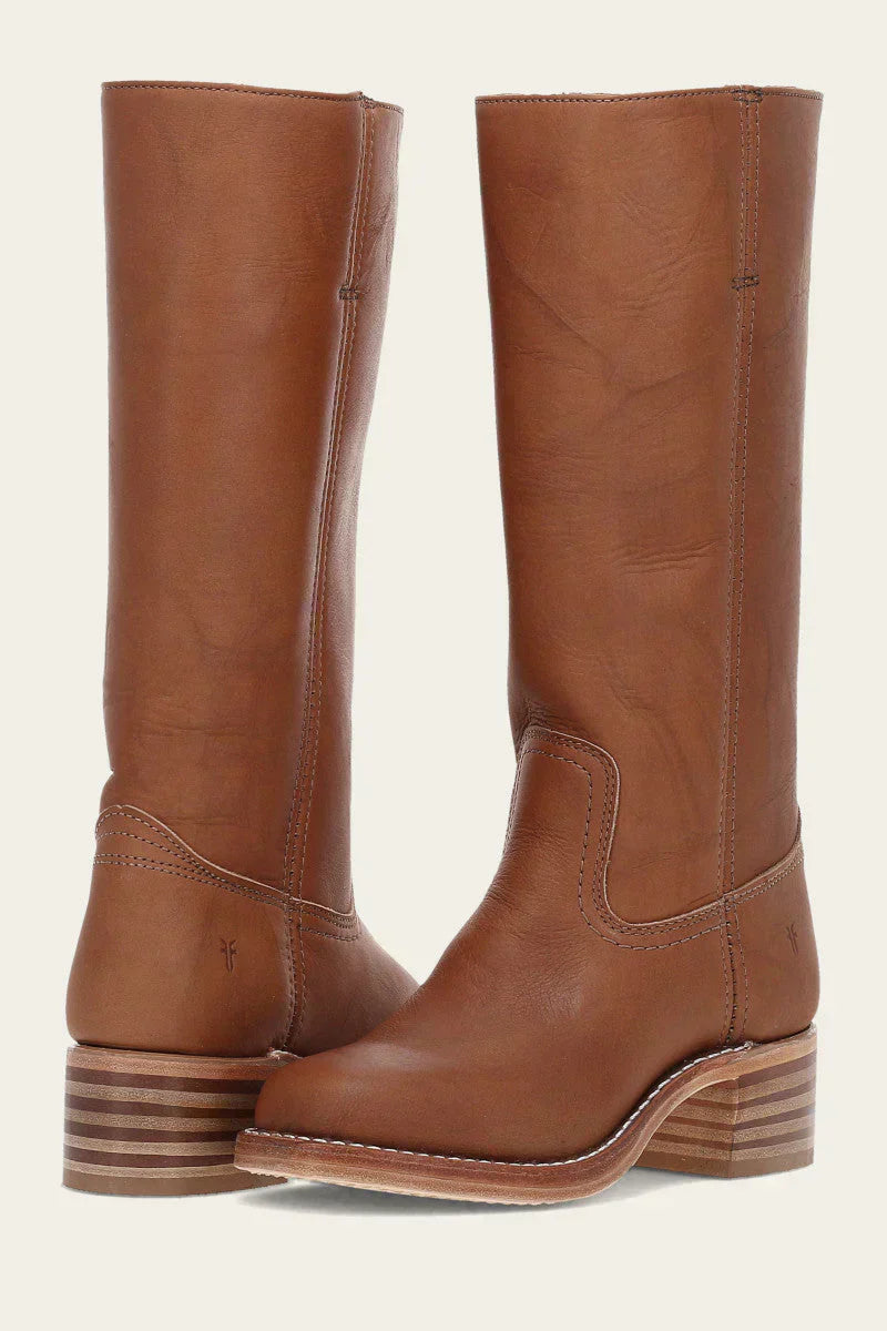 Side profile of the Elara classic Western boots in dark brown, highlighting the stacked block heel and clean lines against a neutral background.