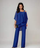 Side profile of a woman wearing the blue Elara elegant two-piece layered set, demonstrating its comfortable fit.