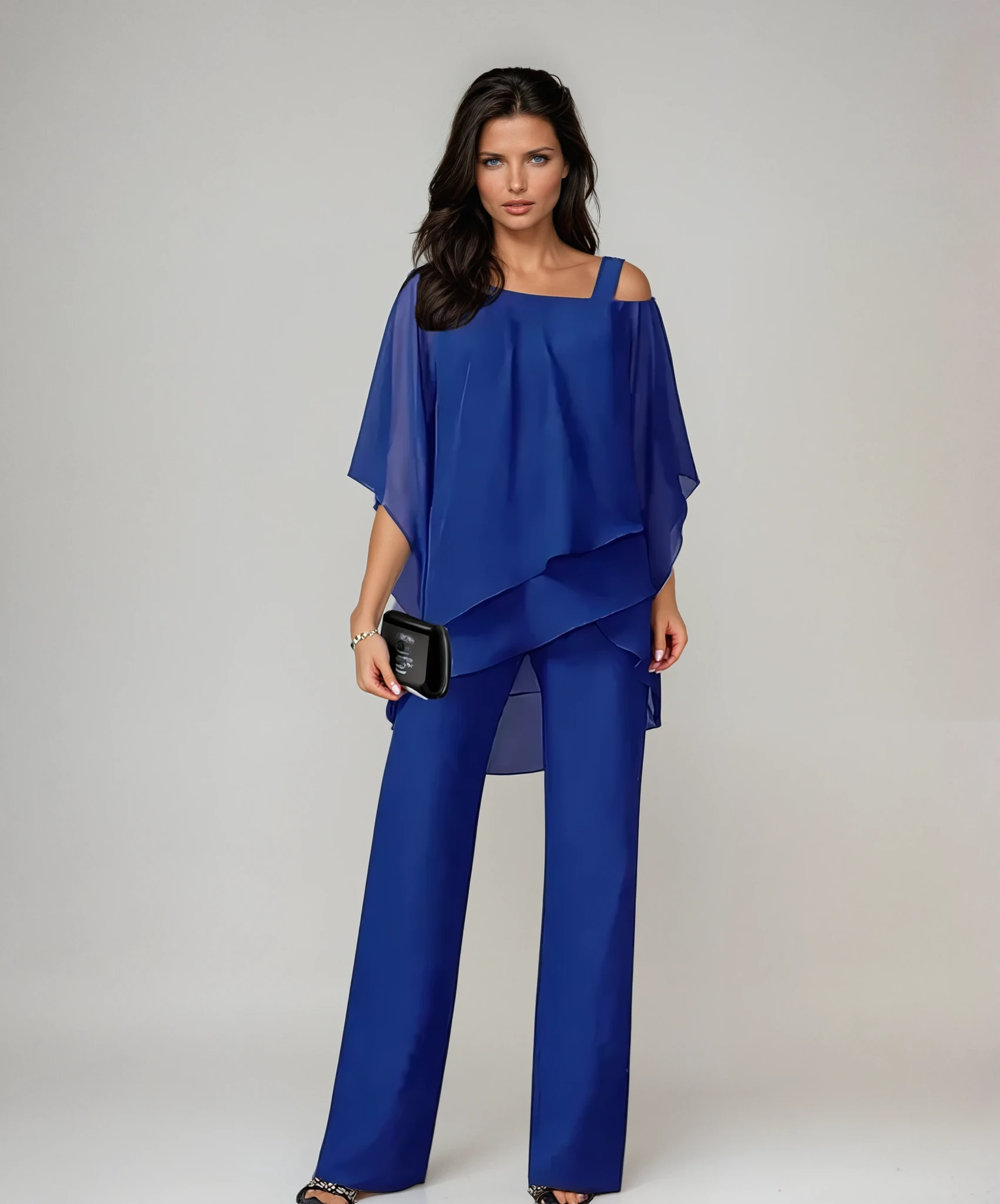 Side profile of a woman wearing the blue Elara elegant two-piece layered set, demonstrating its comfortable fit.