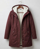 Detail shot of the soft, high-loft fleece lining inside the Elara parka, promising warmth and comfort.