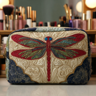 Front view of the Elina Quilted Cosmetic Bag in a delicate dragonfly print, showcasing its elegant texture and design.