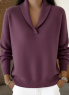 Elina knit pants in purple folded neatly, displaying the versatile color and soft material.