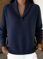 Lifestyle shot of Elina knit pants in blue worn outdoors, perfect for cooler days and comfortable movement.