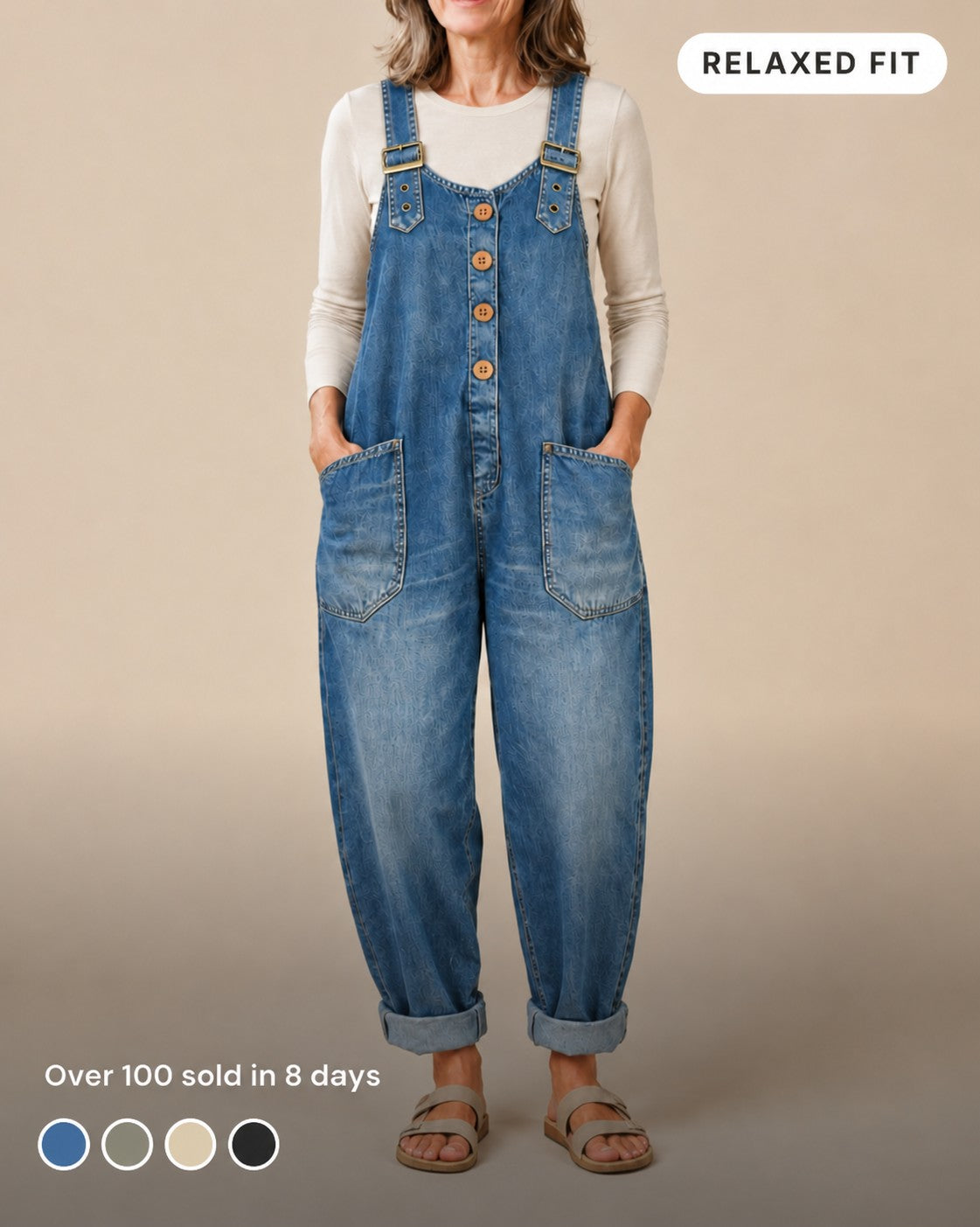 Back view of the blue jumpsuit, showing adjustable shoulder straps and overall comfortable drape.