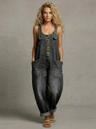 The blue utility jumpsuit displayed on a mannequin, emphasizing its comfortable silhouette.