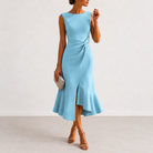 Back view of the Kiera elegant draped midi dress, showing the smooth lines and how the fabric falls.