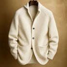 Side profile of a man wearing the Florian wool blend cardigan, highlighting its comfortable fit and drape.