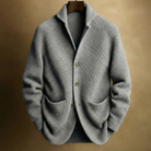 Lifestyle shot of the Florian men's wool blend cardigan paired with a casual outfit, in an outdoor setting.