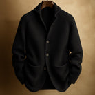 Close-up of the shawl collar and neckline of the Florian men's wool blend cardigan, showing its soft finish.