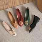A pair of black square-toe flats worn by a model walking, showing natural movement and fit.