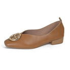 Brown square-toe flats paired with jeans, illustrating effortless everyday elegance and style.