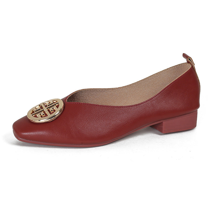 Back view of the green square-toe flats, focusing on the stable 2.5 cm block heel and rubber sole.