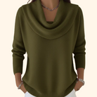 A woman wearing the Hadassah comfort stretch pants in red, styled casually with a top, walking outdoors.