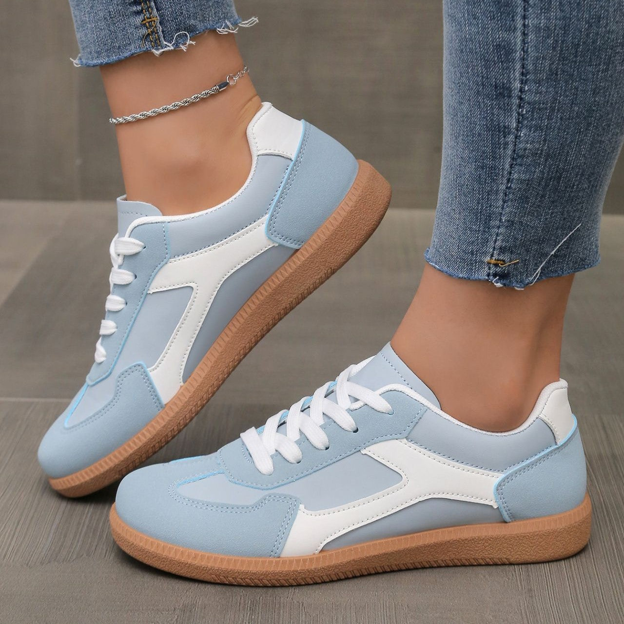 Front view of sky blue Hazel comfort shoes on a clean surface, highlighting the breathable upper.