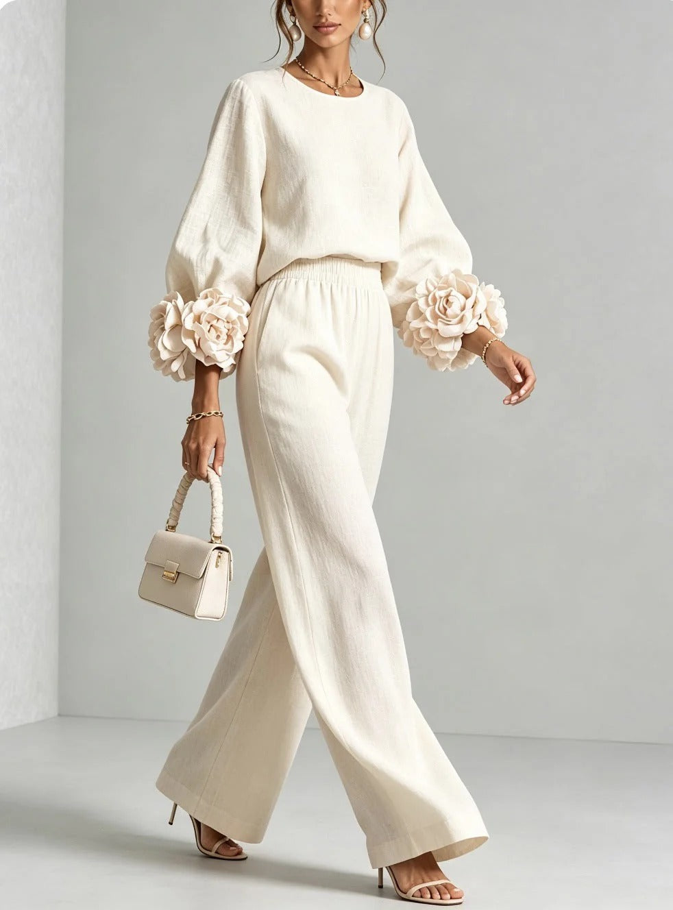 Dynamic shot of wide-leg trousers in motion, capturing the fabric's drape and lightweight feel.