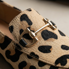 Woman wearing Inez elegant chic loafers, styled with everyday essentials for a polished look.