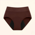 Side profile of a model wearing beige Inez leak-proof protective underwear, demonstrating its seamless fit under clothing.