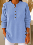 Front view of Kalia essential comfort shorts in a light color, showcasing the loose fit.