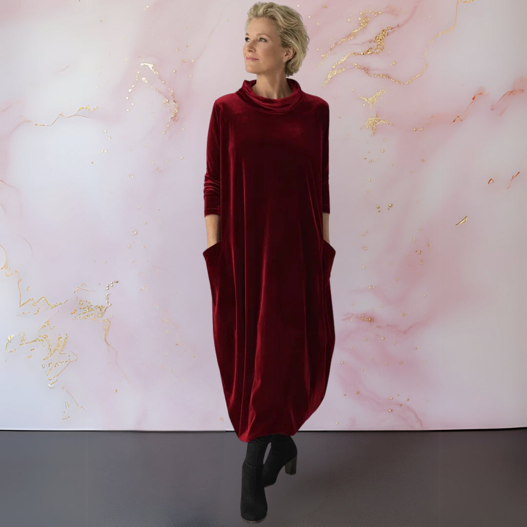 Close-up detail of the modern stand-up collar and soft velvet texture of the Katiya maxi dress.