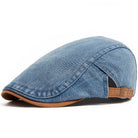 Kian classic denim flat cap worn by a man in a casual outdoor setting, demonstrating its stylish fit.