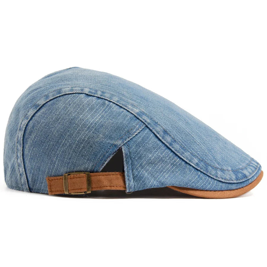 Overhead shot of the Kian classic denim flat cap, revealing the top panel construction and overall shape.