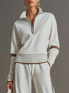 Close-up on the waist area of the comfortable wide-leg pants, detailing the comfortable waistband design.