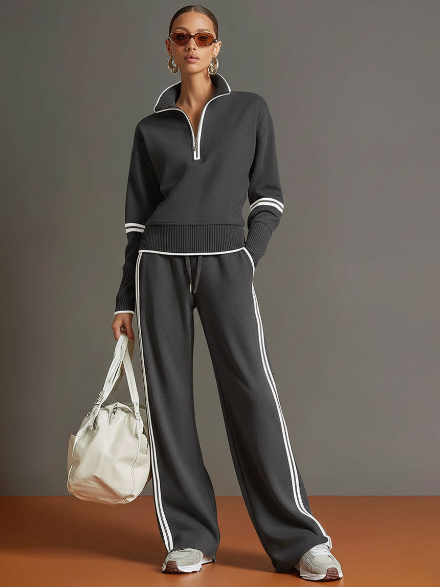 Back view of the woman wearing the elegant wide-leg pants, highlighting the drape and silhouette.