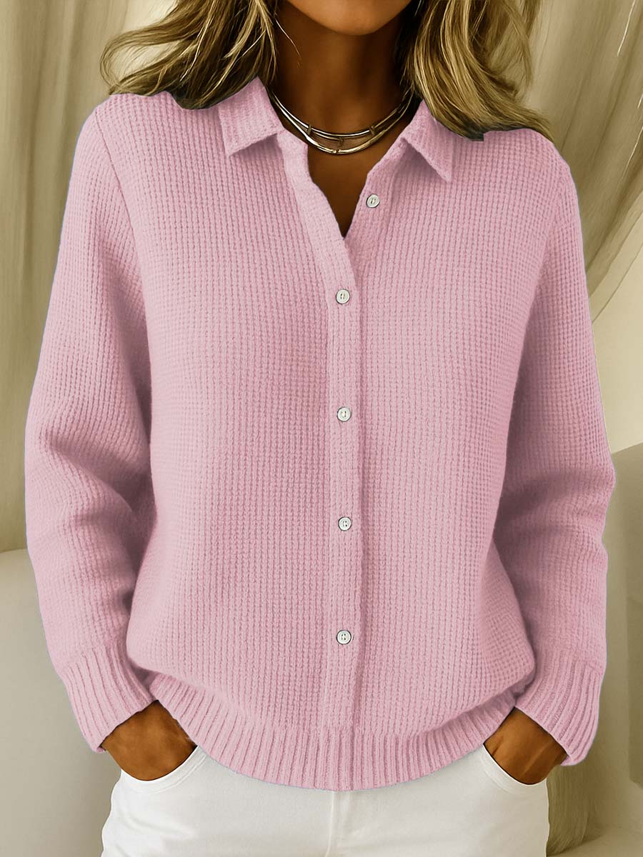 Close-up detail of the button closure and knit pattern on the Lila Classic Button-Up Cardigan.