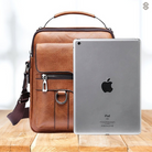 Detail of the strap attachment on the light brown Milo shoulder bag, highlighting the durable craftsmanship.