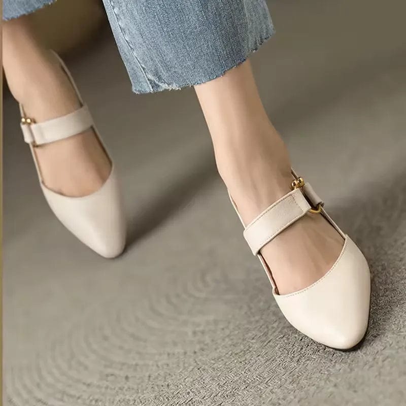 Overhead view of the beige slingback heels, showing the refined design and how the secure strap is positioned.