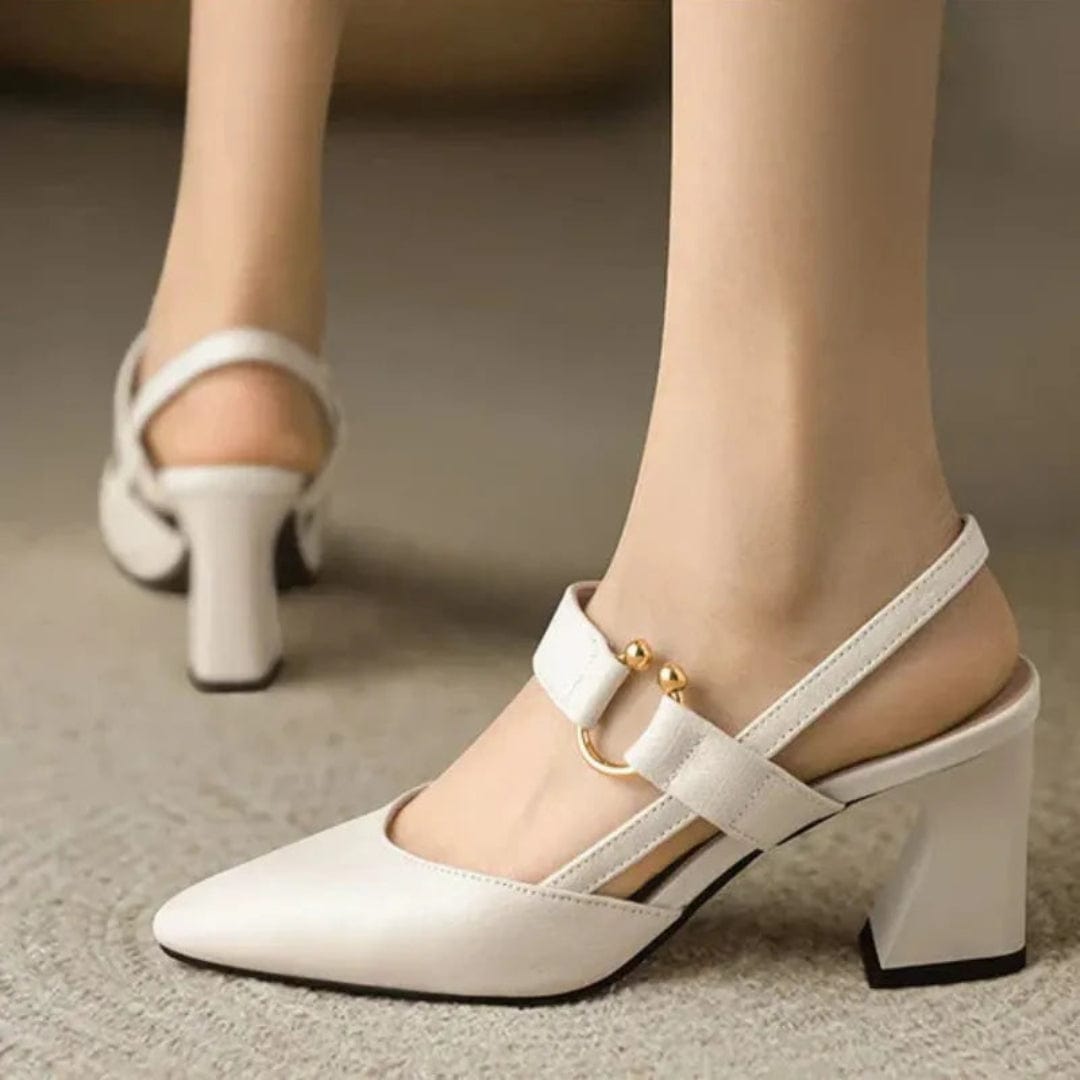 Rear view of the brown leather slingback heels, focusing on the stable 2-inch heel and the reliable non-slip sole.