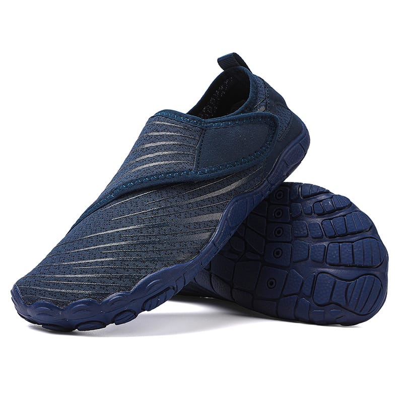 White Maeve comfort orthopedic shoes, sole visible, showing tread pattern.